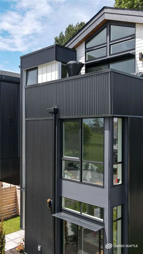 black metal siding modern house|exterior metal siding panels.